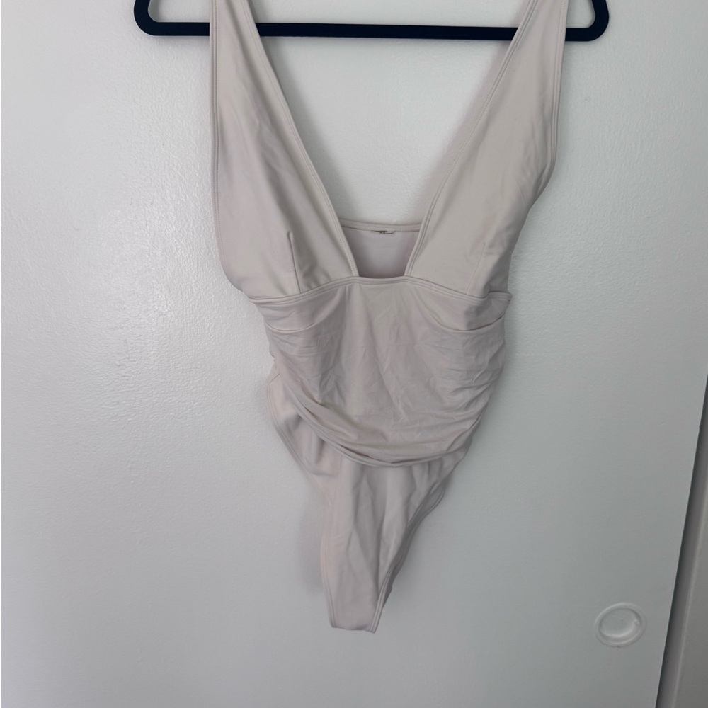 Elegant Cream Women's Bodysuit